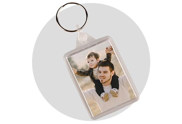 Personalised acrylic keyring showing a photo of father and child. Key rings are small but meaningful Father’s Day gifts. 