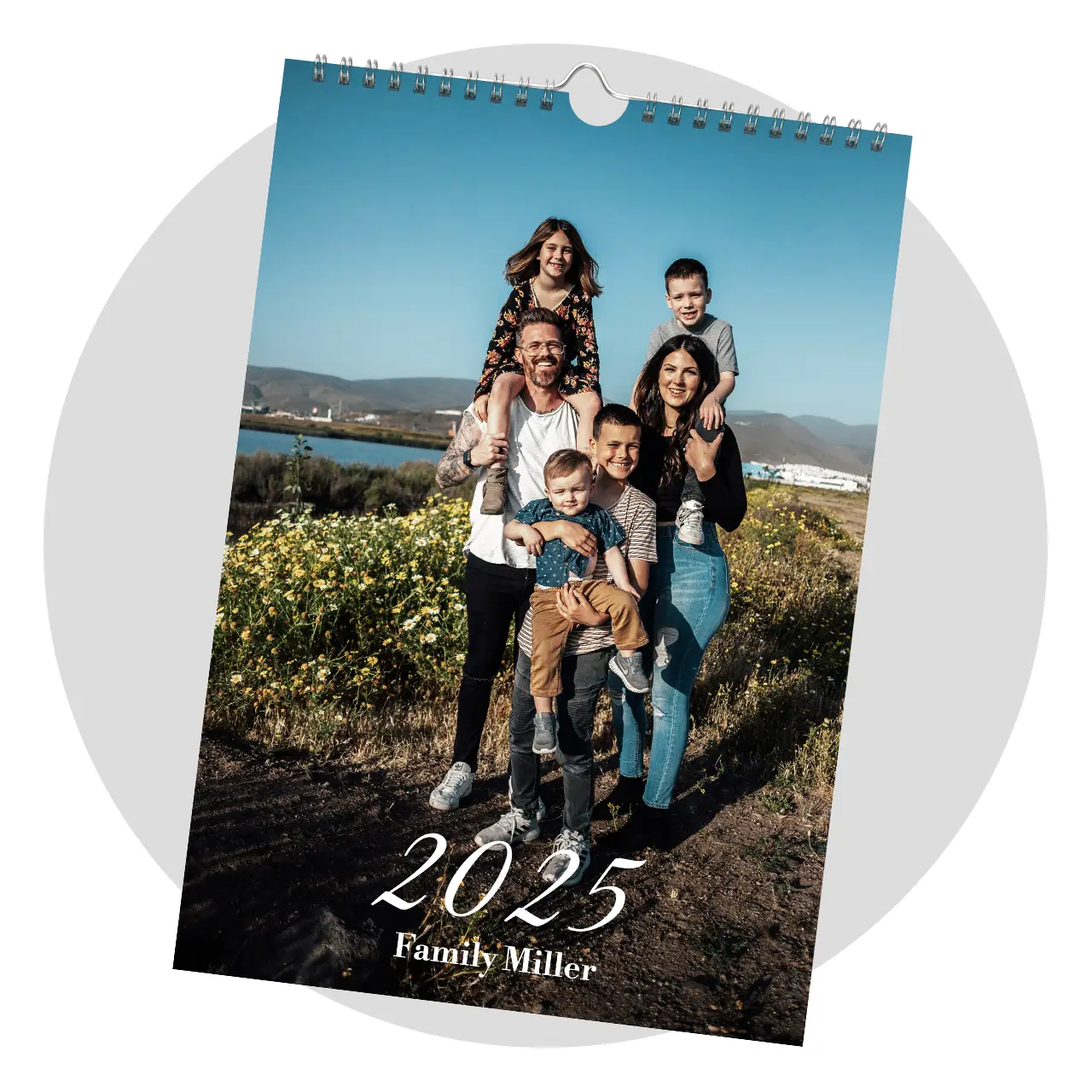High-quality photo calendar in digital print The picture shows the cover page of a personalised calendar with a happy family moment.
