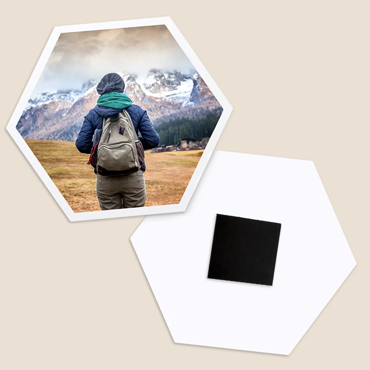 Family photo wall created with hexagon photo tiles Family photos displayed as hexagon photo tiles in a cosy living room