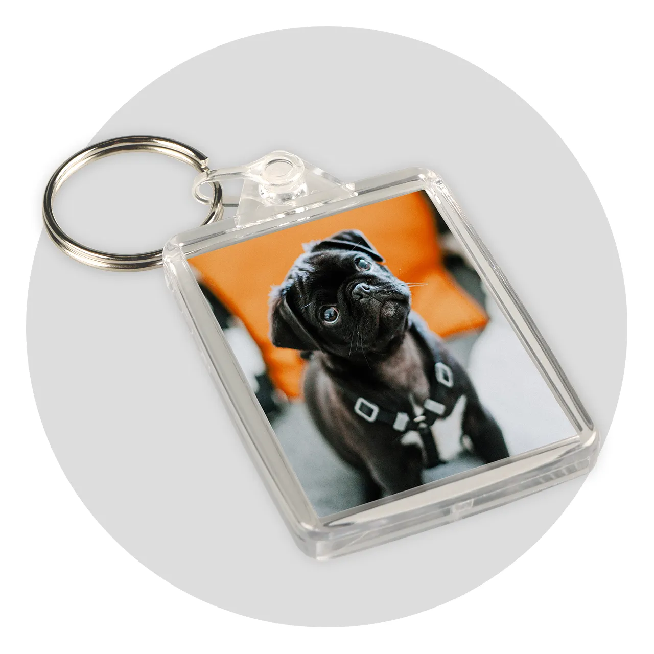 Personalized photo keyrings, acrylic This photo keychain offers plenty of space for your favorite photo. Made from clear acrylic, it's a durable and stylish companion for your keys.