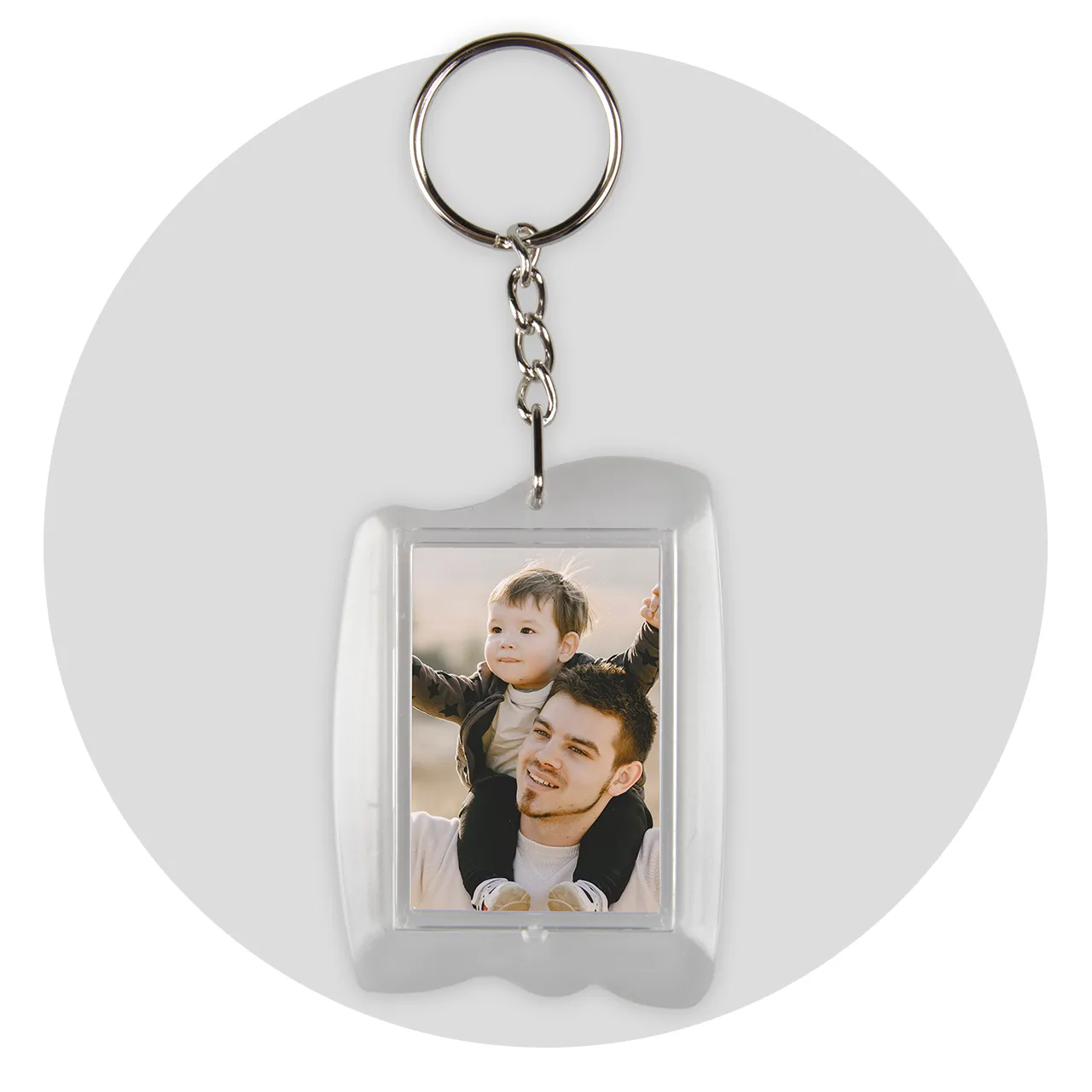 Personalized photo keyrings, acrylic This photo keychain offers plenty of space for your favorite photo. Made from clear acrylic, it's a durable and stylish companion for your keys.