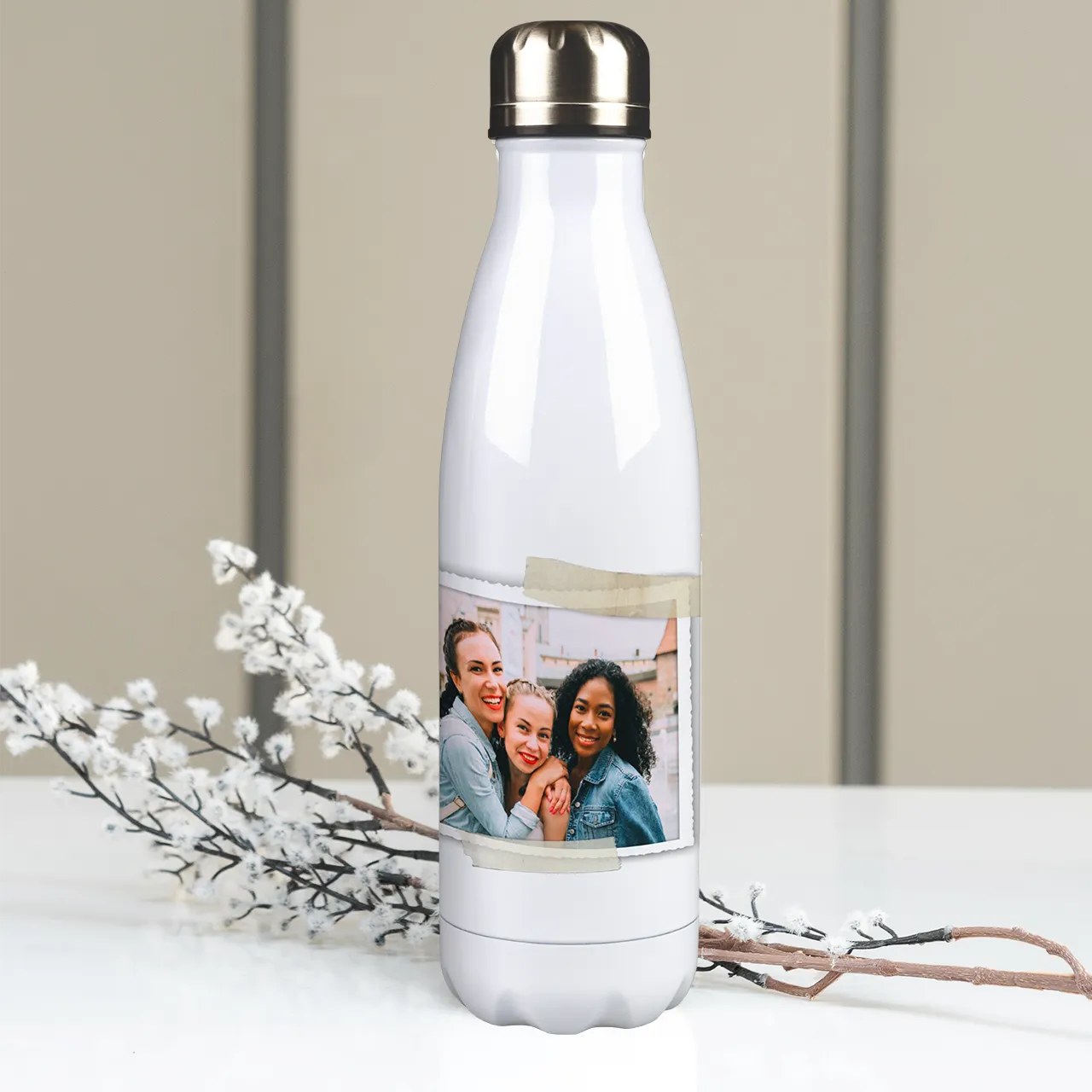 photo drink bottle, 500 ml capacity This personalised water bottle is displayed upright with floral decoration – a thoughtful personalised gift for any occasion.