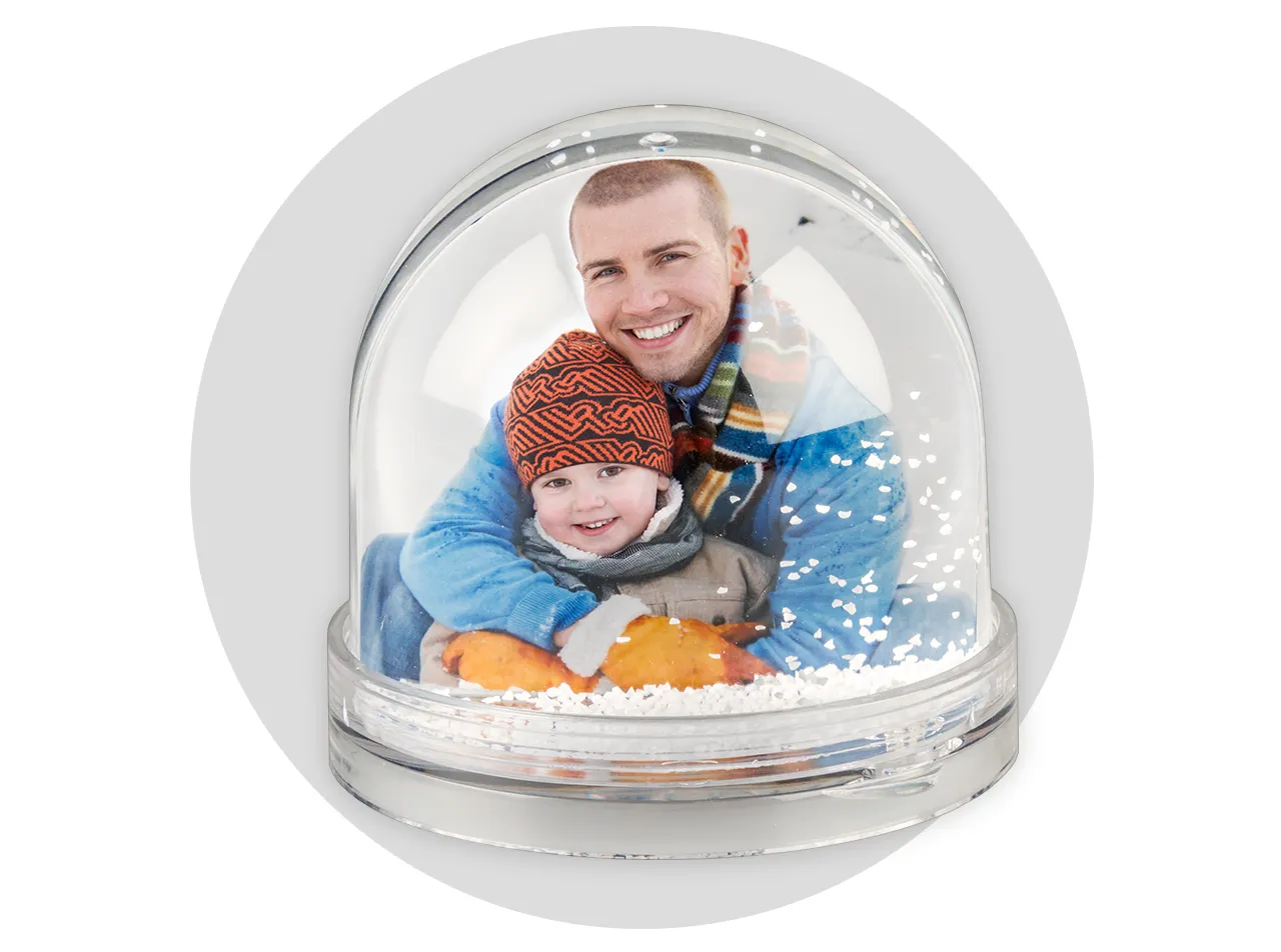 Create your own personalised snow globe with swirling white snow and your favourite photo – made from durable plastic