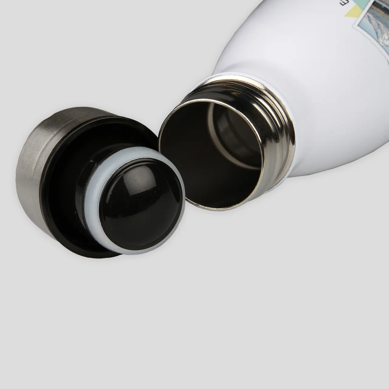 Practical personalised water bottle with cap A custom water bottle with a removable stainless steel cap and printed photo – stylish and practical all year long.
