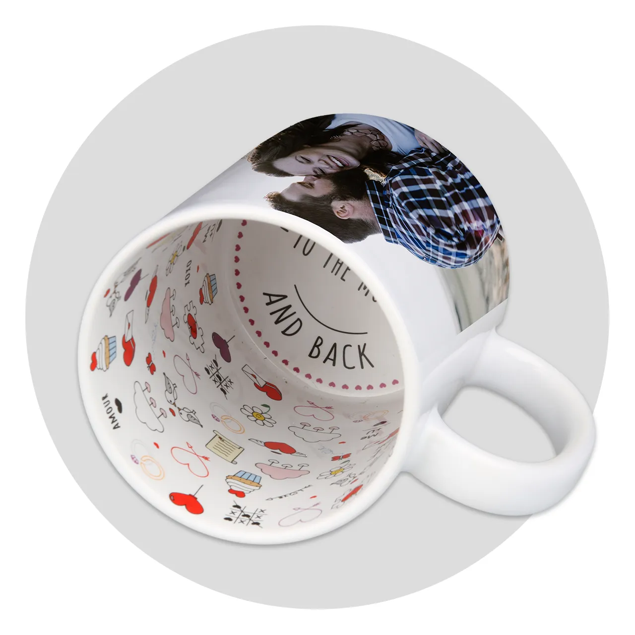 A cup lying on one side with the inside facing forward. Our love mugs are printed with romantic symbols on the inside. Outside, they can be customised as you wish.